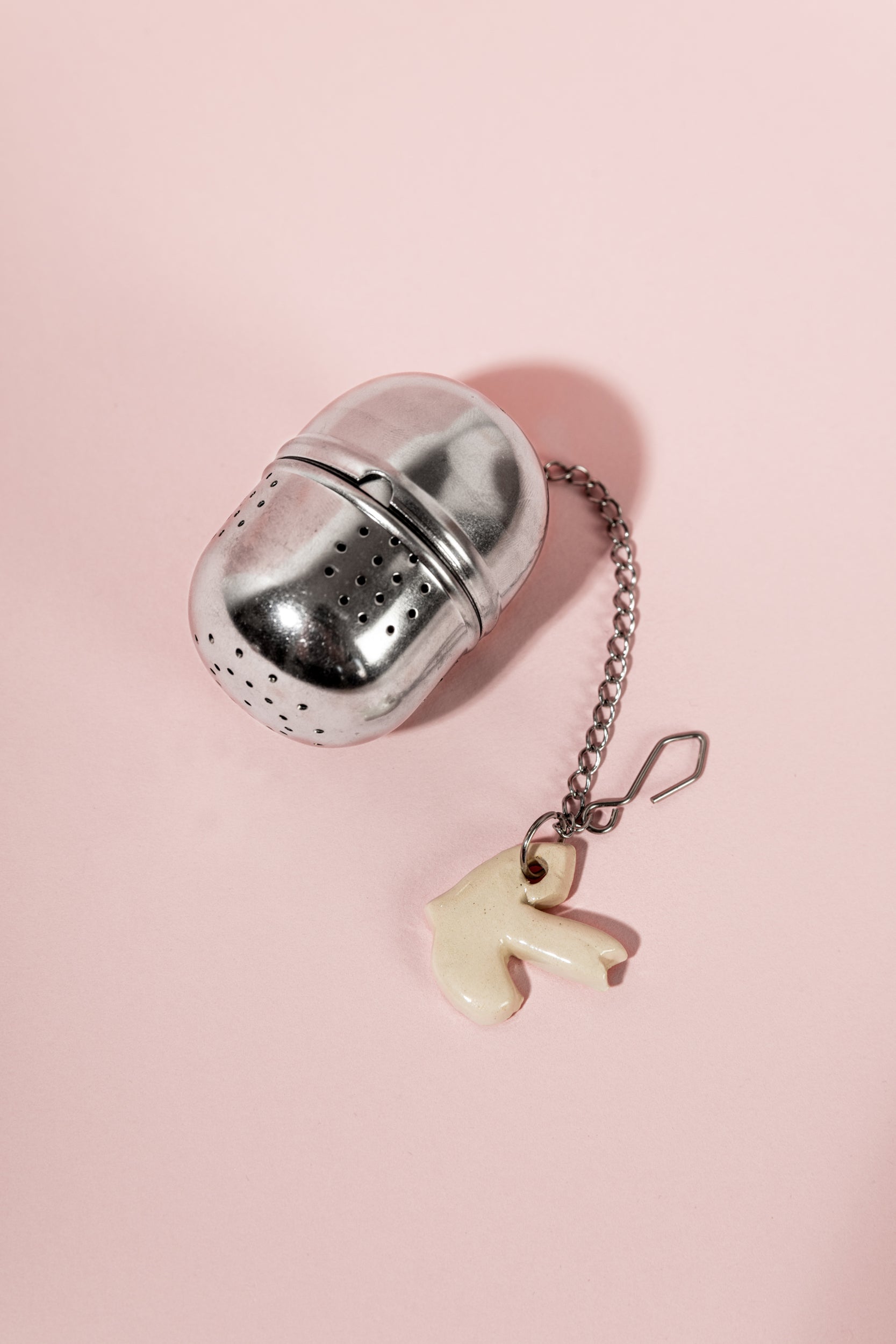 Infusor de chá artesanal em aço inoxidável e cerâmica Criatura