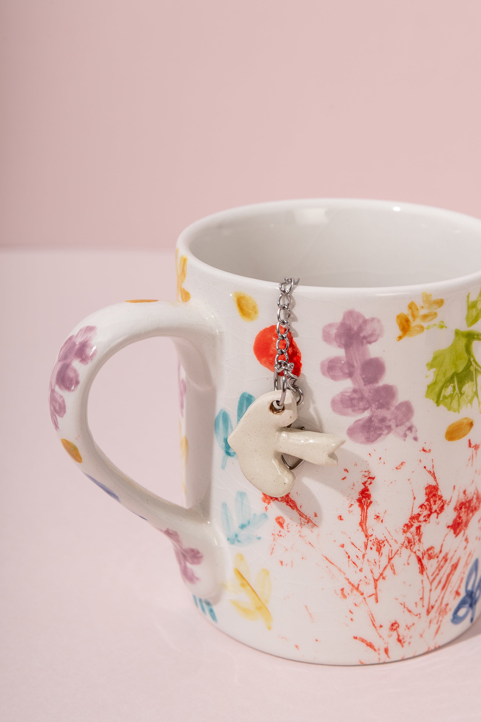 Infusor de chá artesanal em aço inoxidável e cerâmica Criatura